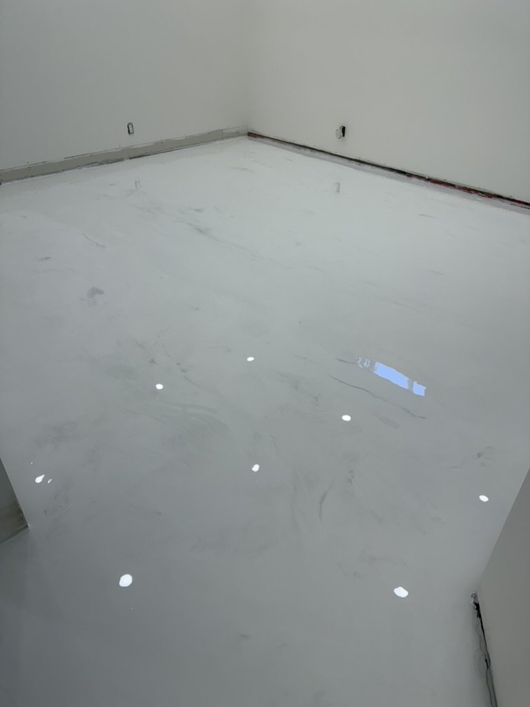 White marble epoxy basement room