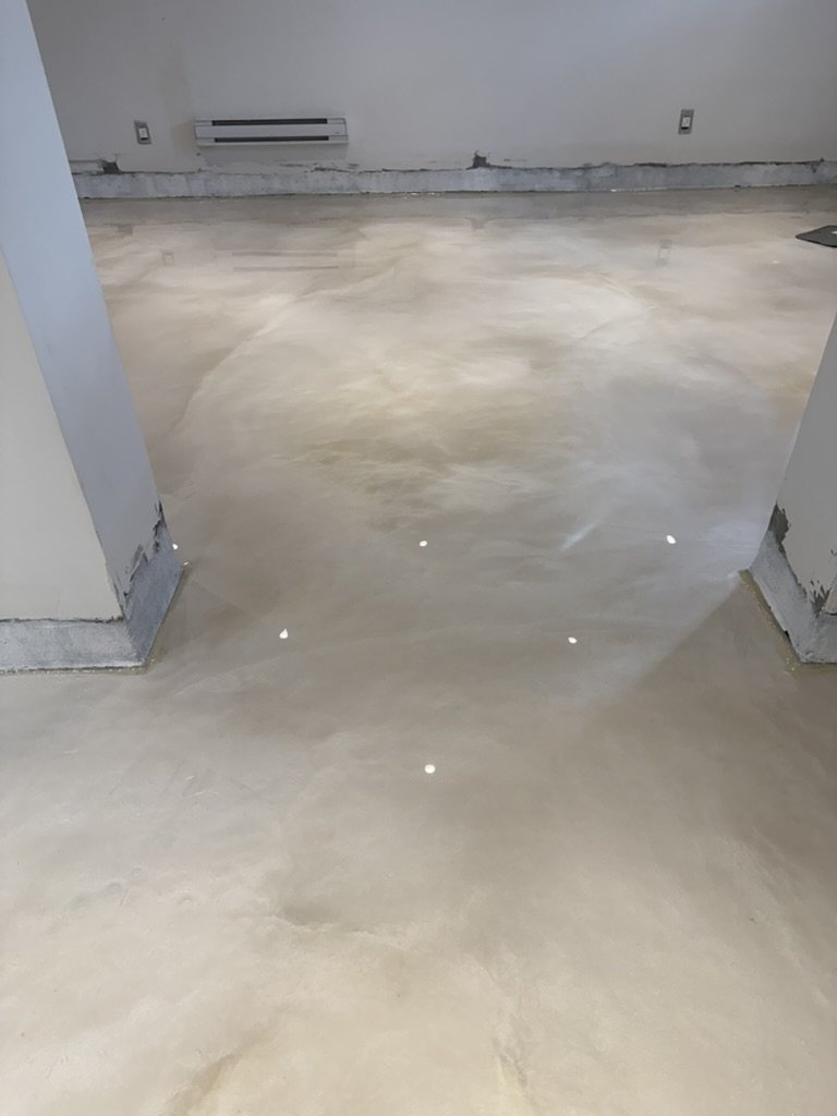 Cream metallic epoxy basement floor
