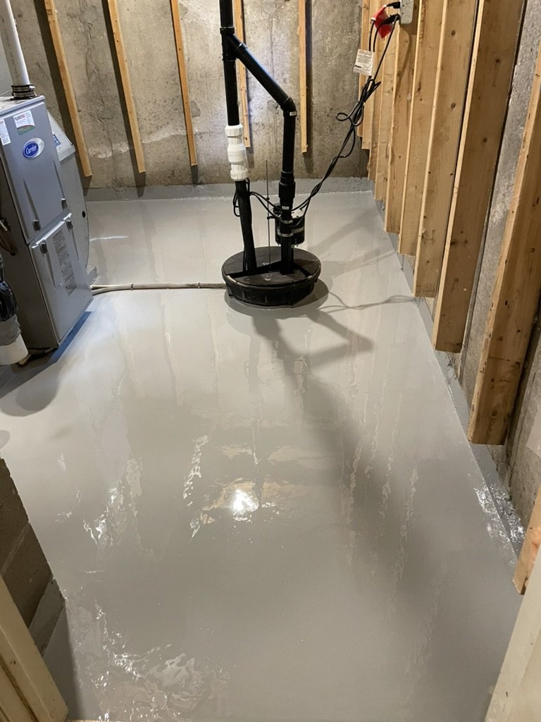 Light gray one coat colour epoxy basement floor