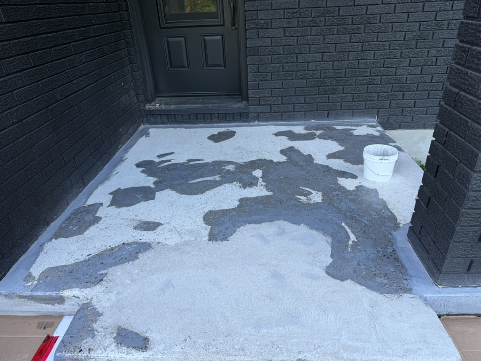 Porch mid-coat during epoxy application, stage two